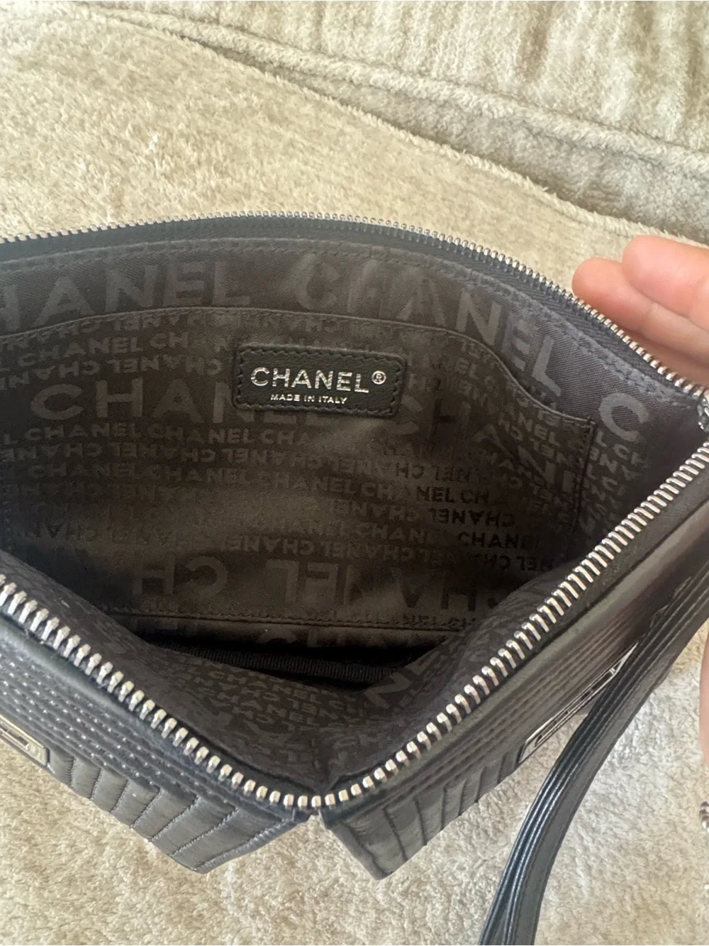 CHANEL Black Leather Wristlet Clutch with Quilted Flap and Silver Turn Locks